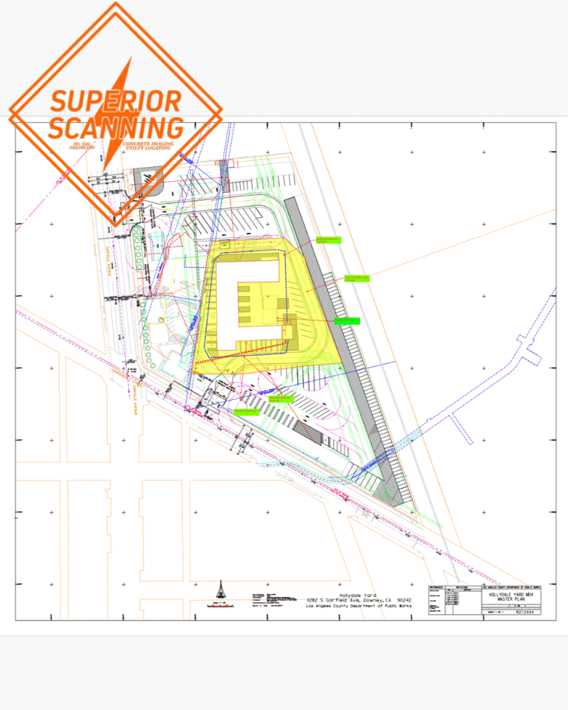 A site plan shows a building footprint highlighted in yellow, surrounded by parking areas and various lines representing roads, utilities, and property boundaries.